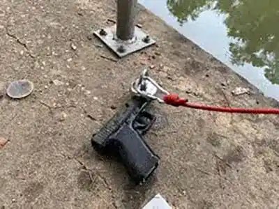 magnet fishing pulls up pistol