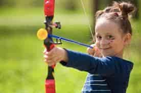 What is Archery for Kids little girl practicing with suction cup arrow