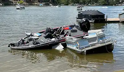bass boat and pontoon boat wreck