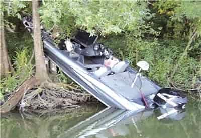 bass boat crash into bank between trees