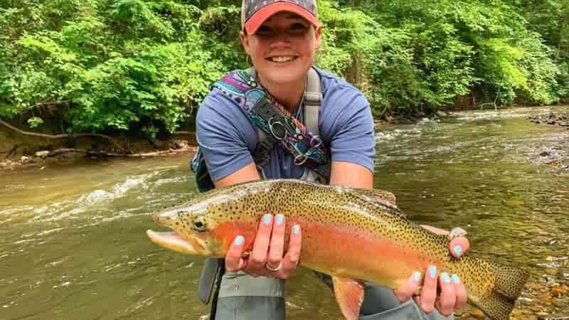rainbow trout caught by young lady in georgia stream near cartersville georgia