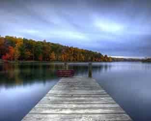 cool misty morning overlooking pier and lake in North Carolina 1a