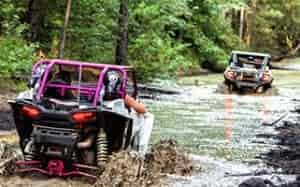 utv riding in mud trail seat high water