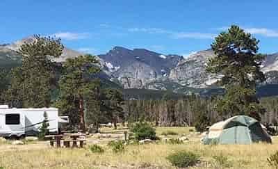 rocky mountain camp ground with tents and RVs