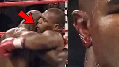 evander holyfield has part of his ear biten off by mike tyson in heavy weight fight