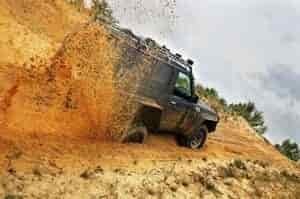 off rading in sand in the out door wooded area