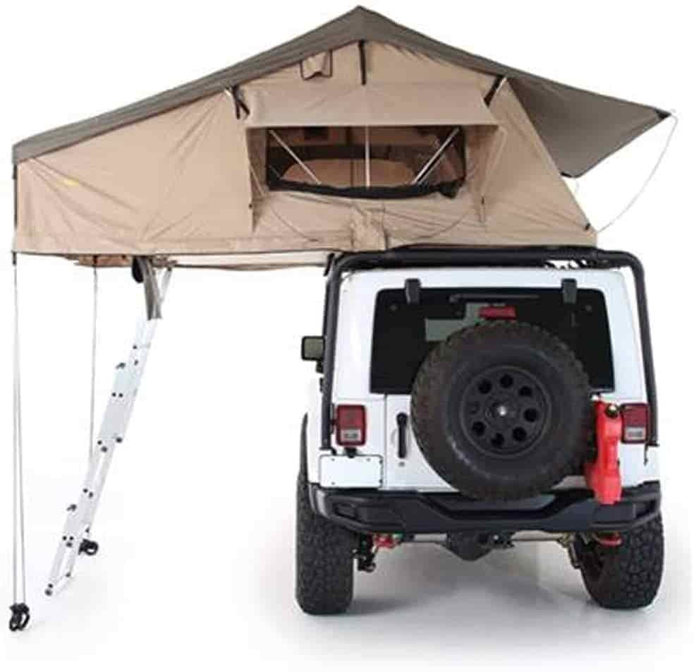 smittybuilt roof top tent mounted on white jeep