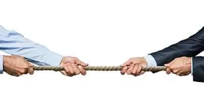 tug of war rope 2 men pulling