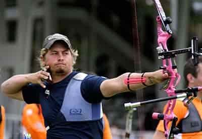 brady ellison aiming at target recurve bow in hand