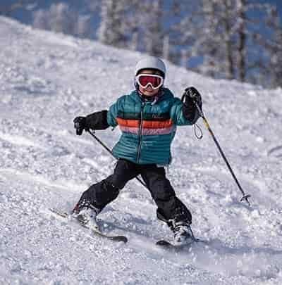 small child snow plowing