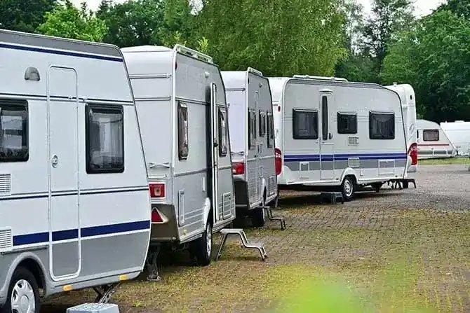 travel trailers lined up in rv park no how to purchase an rv through negotiating