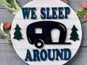 hanging sign we sleep around