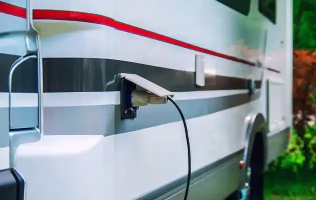 RV Plugged into the Water and Sewage System