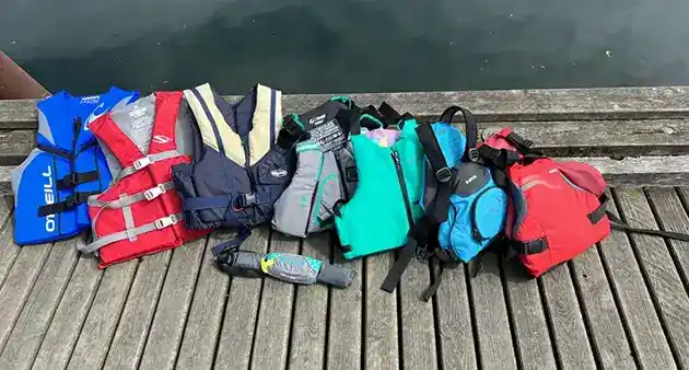 group of life vests on pier