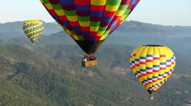 15 hot air balloons in air