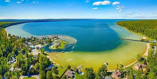 Burt Lake sand beach on the Indian River